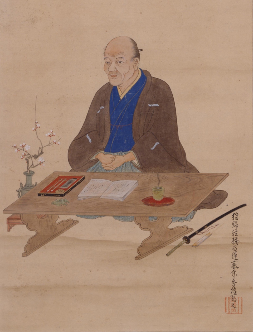 文机の前に座る貝原益軒を描いた肖像画